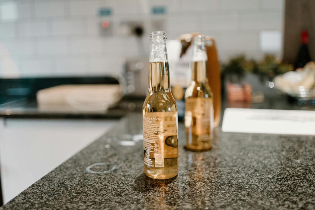 Craft beer bottles on a counter, available for delivery in San Francisco from Mike's